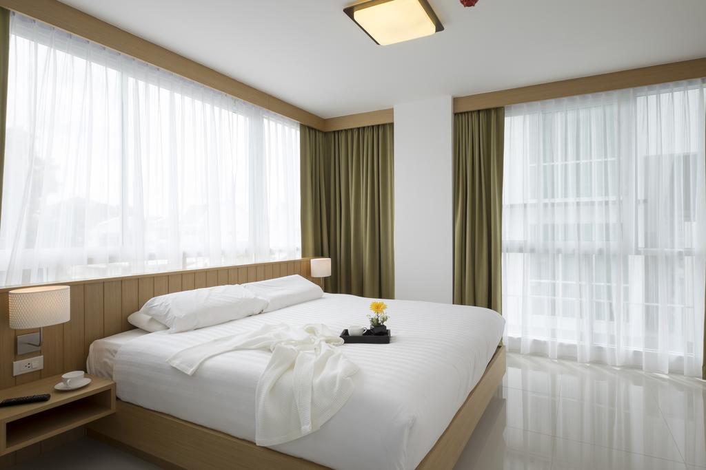 Modern Thai Suites Phuket Zimmer foto